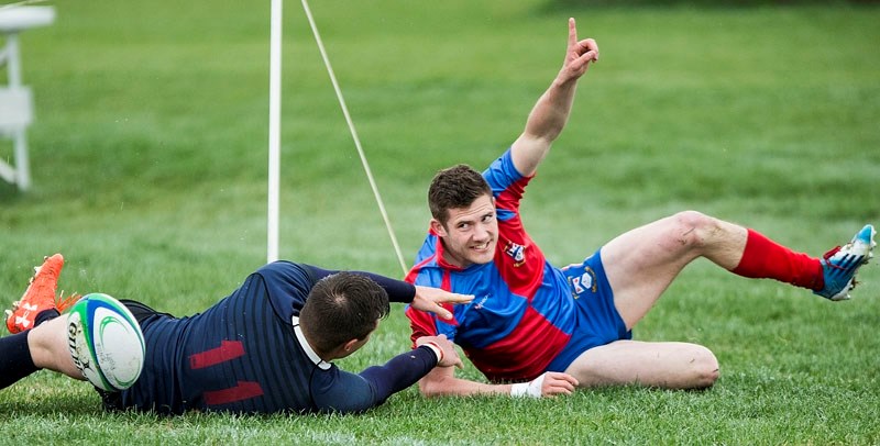 NUMBER ONE – Duncan Maguire lets everybody knows he scored after cracking the try line for the fantastic firsts against the Clan in the first half of the Alberta Cup premier
