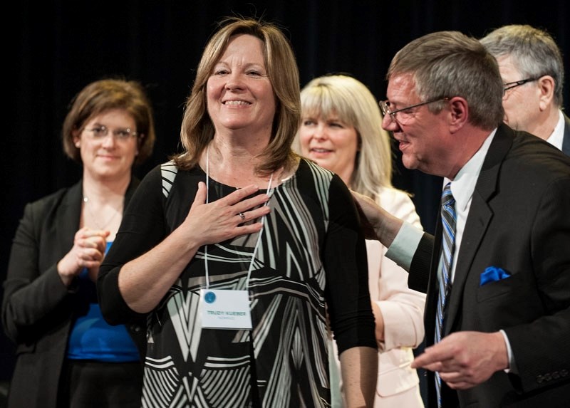 Trudy Kueber was humble in accepting her win as the Volunteer Citizen of the Year from Joe Becigneul