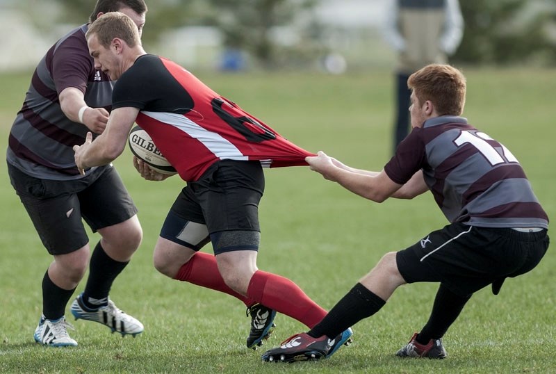 JERSEY PULL â€“ Adam Bochar of the Bellerose Bulldogs tries to slow down Bailey Parno of the Sturgeon Spirits in last week&#8217;s metro Edmonton division two match. Sturgeon 