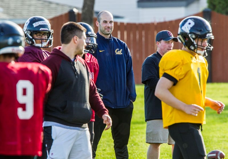 GUEST COACH â€“ Jordan Maksymic checks out the action Thursday as the guest coach at the Bellerose Bulldogs&#8217; spring camp. The quarterback coach for the Edmonton Eskimos 