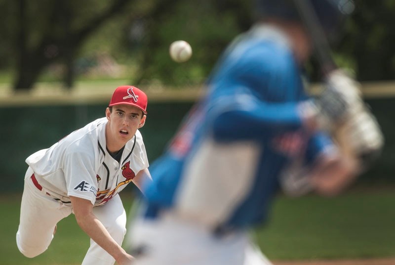 St. Albert Cardinals&#8217; starting pitcher Landon Christoffel pitches to a Camrose Cougars&#8217; batter during the midget AA finals at the Larry Rindero Memorial