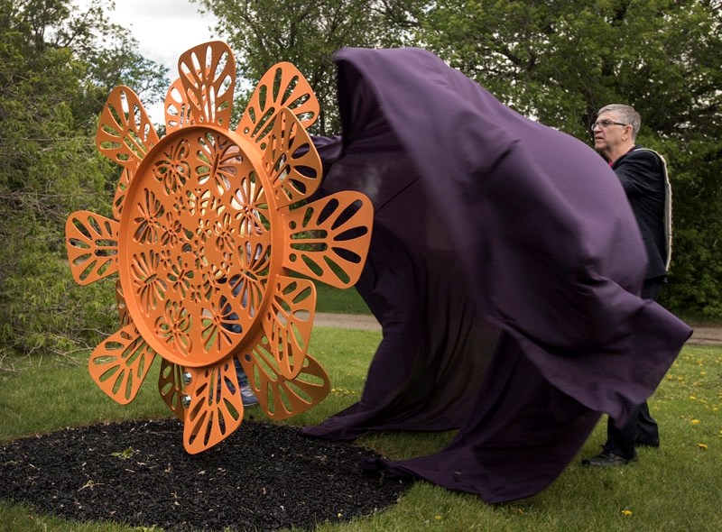 Butterfly Flower Kaleidoscope by Calgary artist Karen Ho Fatt. It is installed along Founders&#8217; Walk on Meadowview Drive.