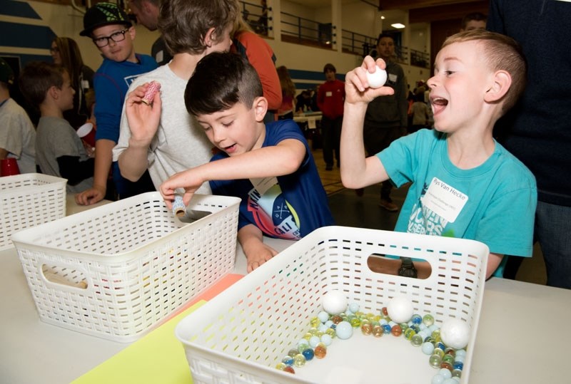 EUREKA! – Morinville Public School student Rys Van Hecke celebrates as he finds the perfect part for his prototype food safety scanner during the 2017 Sturgeon STEAM Games at 
