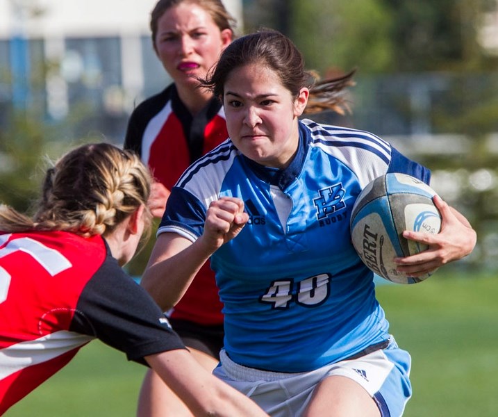 Paul Kane Blues women&#8217;s rugby inside centre Katelynn Shigeta prepares to lower the boom on her Sturgeon Spirits&#8217; opponent during Tuesday&#8217;s division two