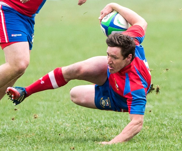TUMBLER â€“ Jake Robinson loses his balance during Alberta Cup action with the St. Albert premier men&#8217;s team. The winners of the last three Labatt&#8217;s Cup