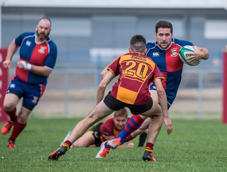 SHIFTY â€“ Brad Angove of St. Albert goes one-on-one against a Nor&#8217;Wester in third division action last weekend. St. Albert is 3-1 after the 59-19 victory and the next