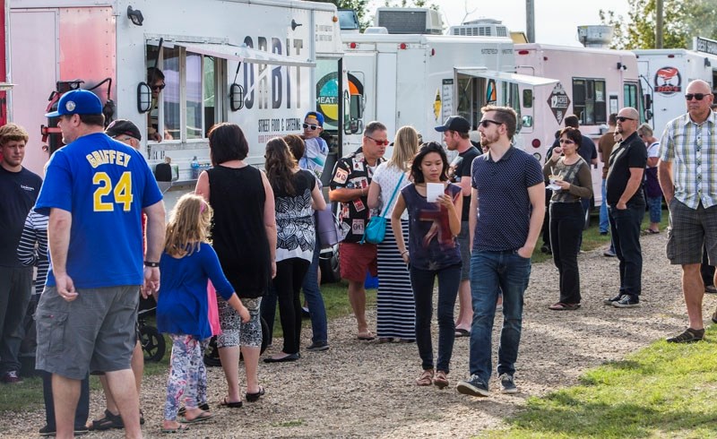 Hundreds of hungry diners lined up outside the many food trucks stationed at Grain Elevator Park last August.