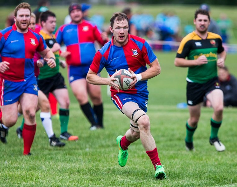 RUNAWAY – Orrin Farries of the St. Albert dashes towards the try area after picking off a pass by the Lep/Tigers for a score in the 17th minute of Saturday&#8217;s premier