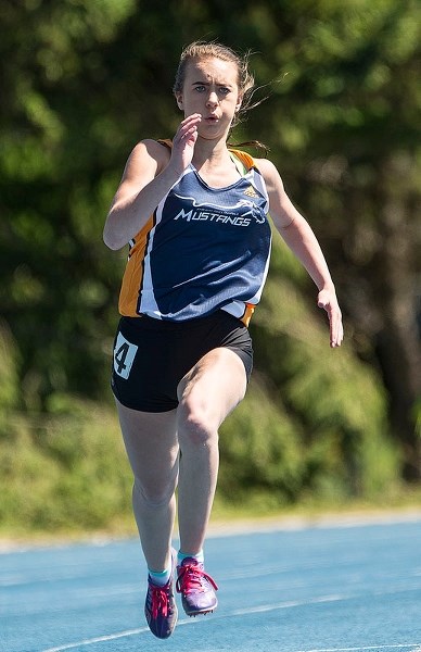 ACCELERATION â€“ Elizabeth Elmore of the St. Albert Mustangs motors in the fast lane at Fowler Athletic Park.