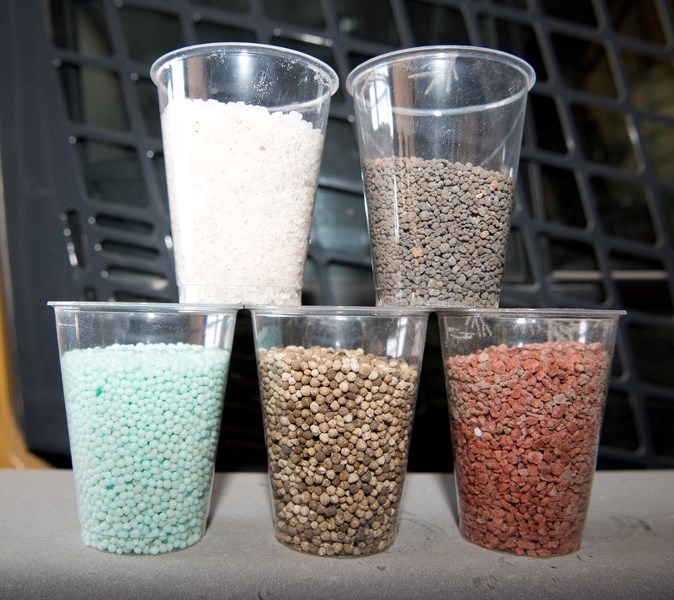 INGREDIENTS FOR GROWTH – Common examples of fertilizer found at Sturgeon Valley Fertilizer. Clockwise from the upper left are ammonium sulphate