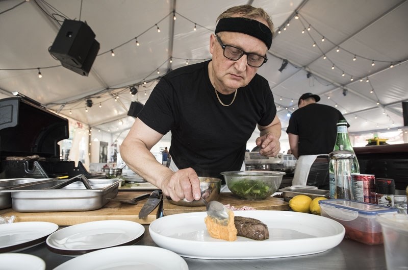 St. Albertan Miroslaw Kolasa prepare his dish in the steak competition of the Canadian Food Championships in Edmonton&#8217;s Sir Winston Churchill Sq. as part of the Taste