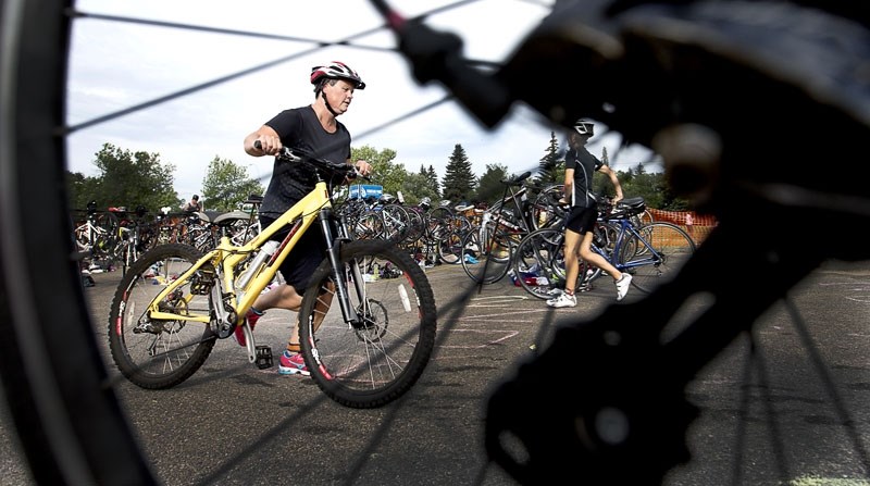 TRI TIME â€“ A competitor at last year&#8217;s St. Albert Triathlon prepares for the bike portion of the event at Fountain Park Recreation Centre. This year the 28th annual