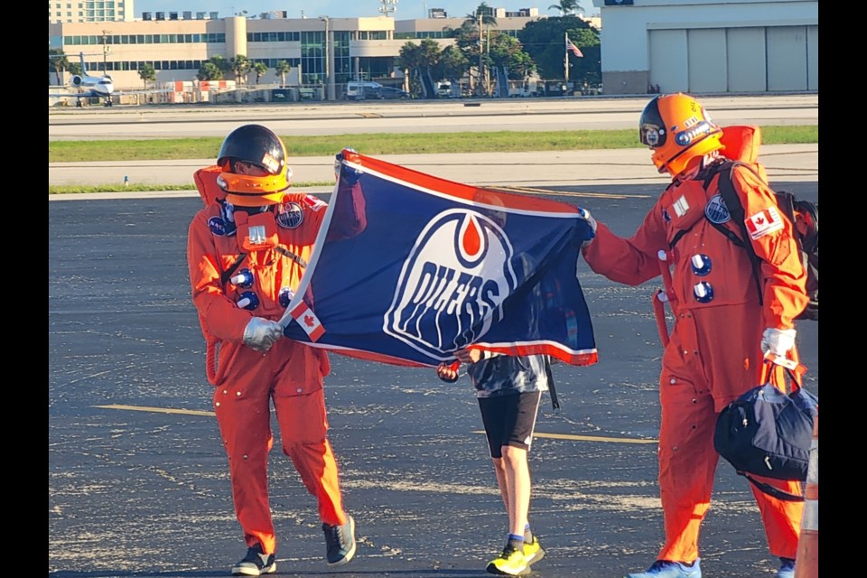 Oilers fans in Florida celebrating Game 7 of the Stanley Cup finals.