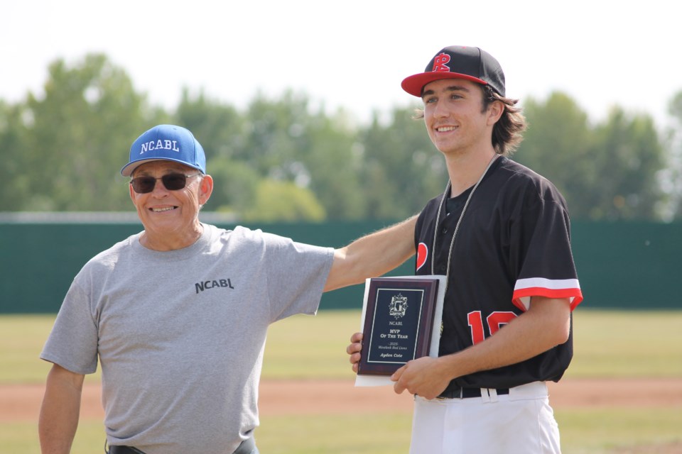 Commissioner Paul Riopel (left) with Ayden Cote (right) proudly holding the MPV of the Year award, becoming the first NCABL player to do so since 2018. 