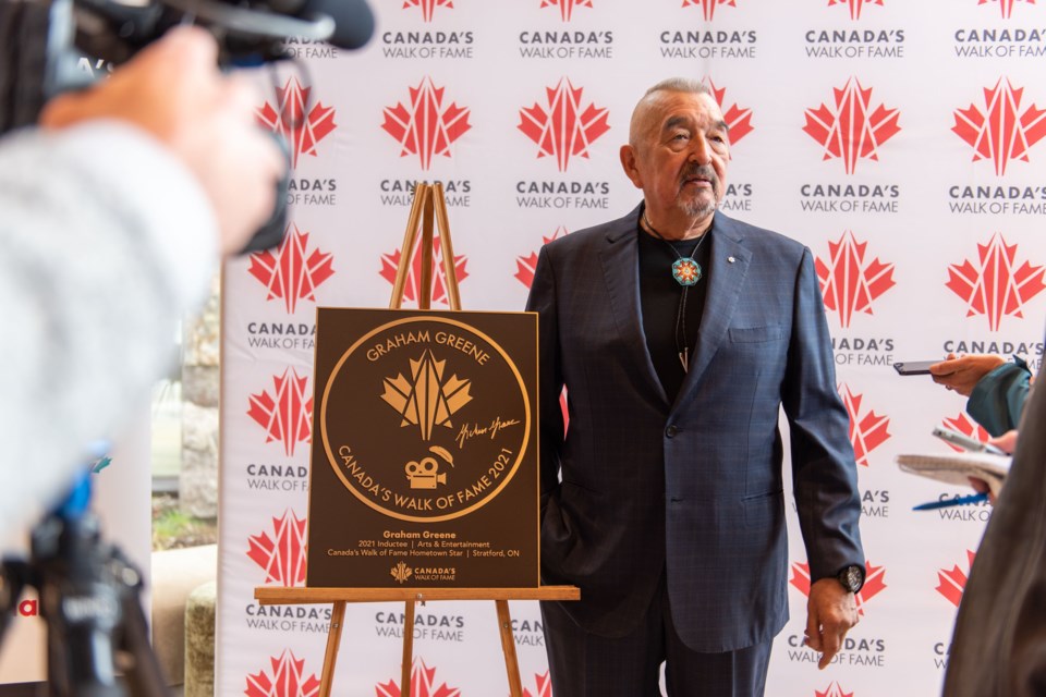 Graham Greene with his Canada Walk of Fame plaque.