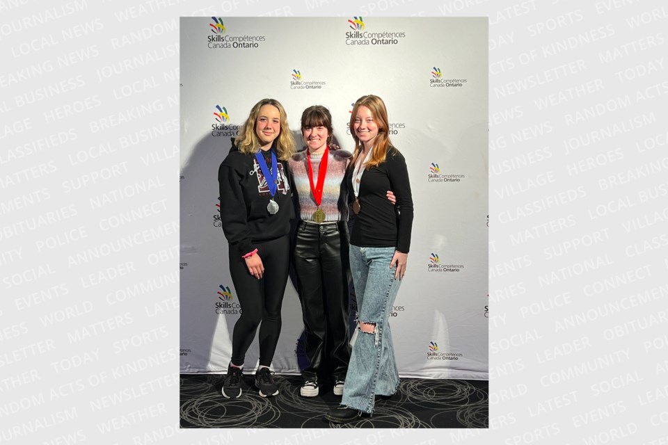 Grade 10 student Anne D. (centre) from St. Michael CSS in Stratford won gold in aesthetics.