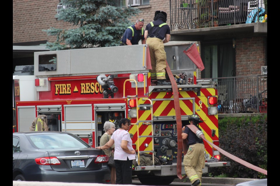 Firefighters put away hoses after a minor incident involving a breadmaker on Kappele Circle. 