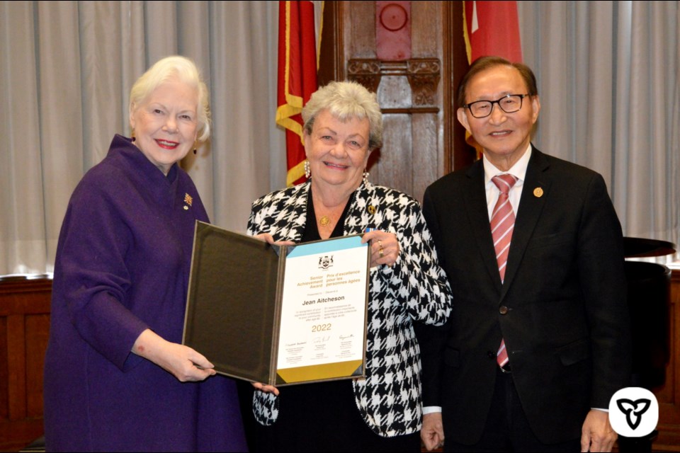 Hon. Elizabeth Dowdeswell, Lieutenant Governor of Ontario (left) and Raymond Cho, Minister for Seniors and Accessibility honour Stratford senior Jean Aitcheson at ceremony on Tuesday