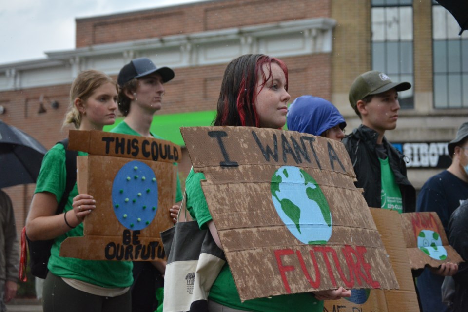 Jocelyn Williams holding her "I want a future" sign. Williams was one of the walkers and speakers at the 2023 Stratford March to End Fossil Fuels. 