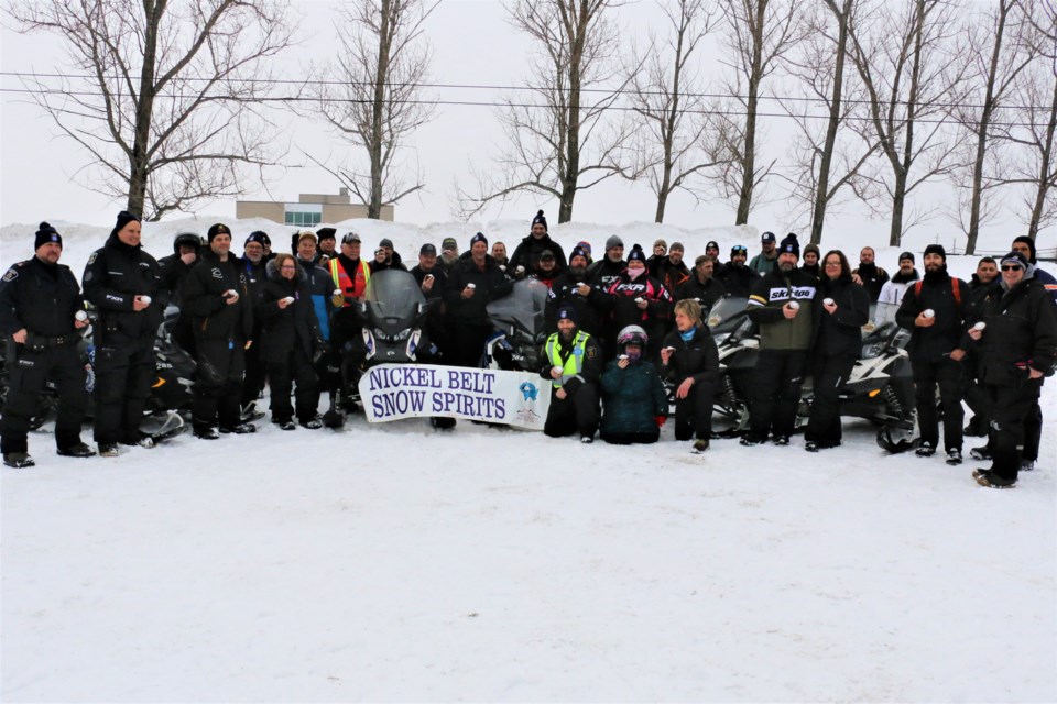 Greater Sudbury Police Service officers and supporters of Special Olympics took part in the annual snowmobile ride in support of the Law Enforcement Torch Run for Special Olympics on Sunday.  (Len Gillis/Sudbury.Com)