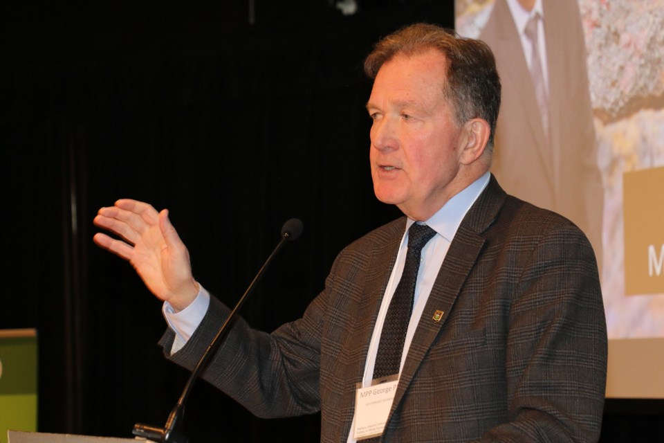 Ontario Mines Minister George Pirie spoke at Cambrian College on Feb. 8. (Len Gillis/Sudbury.com)