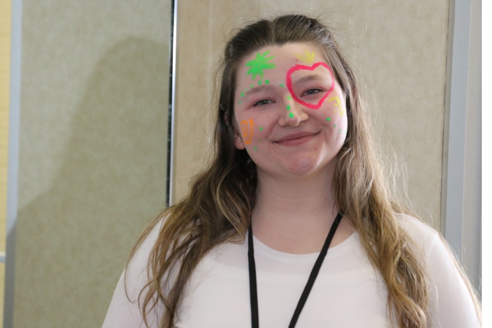 L’Arche  Sudbury development leader Kassandra Bazinet helped organize and celebrate the Family Day glow-party