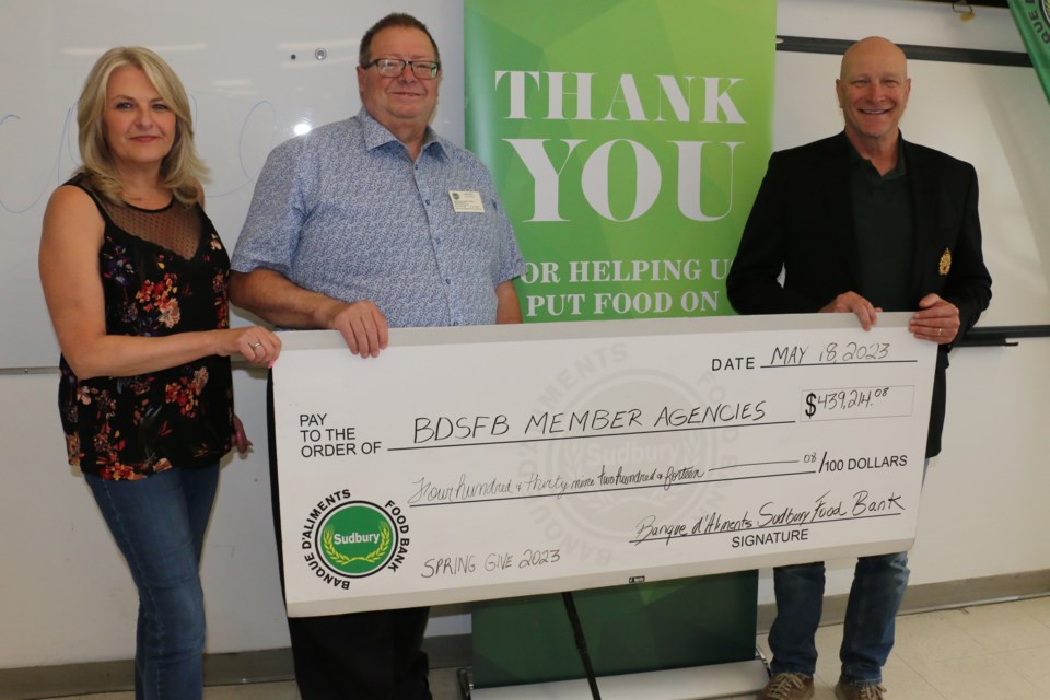 Banque d’aliments Sudbury Food Bank (BDSFB) has provided more than $439,000 to its 44 member agencies in Sudbury. The presentation took place Thursday with food bank president Mellaney Dahl, left,  executive director Daniel Xilon and food bank chair Paul Pedersen.  (Len Gillis / Sudbury.com)