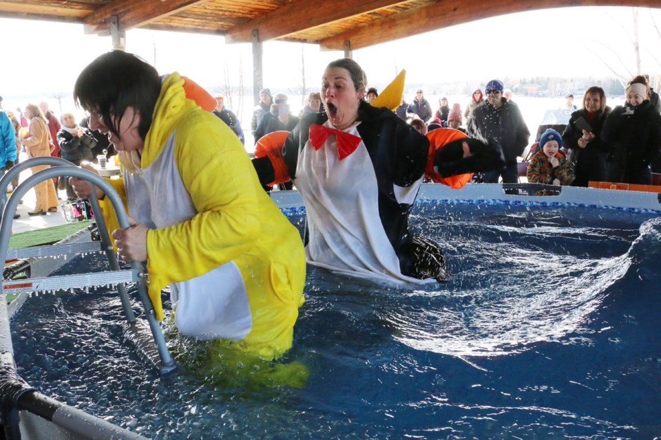Greater Sudbury city councilors Pauline Fortin, left, and Natalie Labbée both took part in the fundraising polar plunge into an icy swimming pool Sunday. (Len Gillis/Sudbury.com)