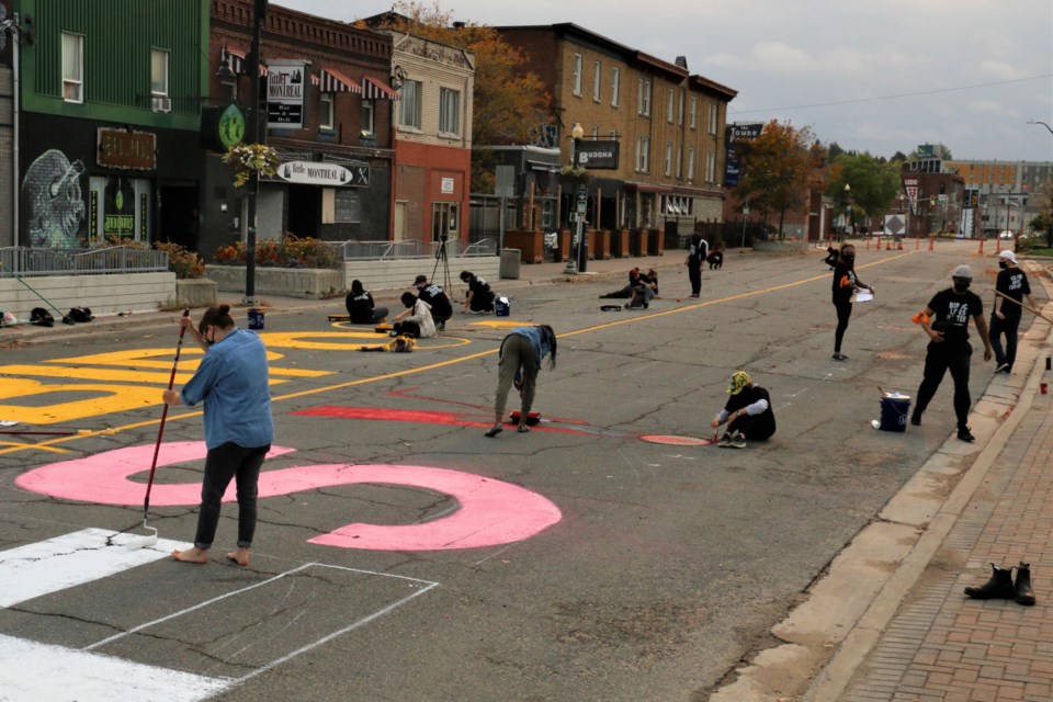 New ground mural being created on Elgin Street by Black Lives Matter Sudbury along with other social awareness groups.  (Len Gillis / Sudbury.Com)