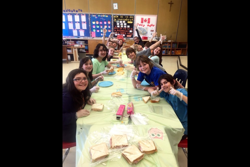 As part of the Catholic Education Week celebrations at St. Paul School, Mme Lawrence’s Grade 5-6 French Immersion class assisted those who are less fortunate by making more than 160 sandwiches for the Elgin Street Mission. By helping those in need, the students showed a great example of stewardship and servant leadership. Mme Lawrence is very proud of her students who collectively completed their classroom mission to make their community a better place. The Elgin Street Mission served their handmade sandwiches that evening. Supplied photo