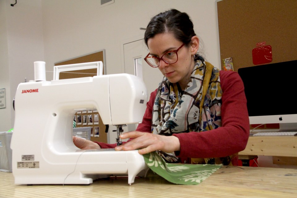 Colleen Burns, maker-in-residence with the Greater Sudbury Public Library, sews cloth napkins at the library's main branch makerspace. Burns is giving a presentation on cultivating a maker family at Sudbury Maker Fest at noon this Saturday, May 6. The event takes place at Science North. (Matt Durnan)