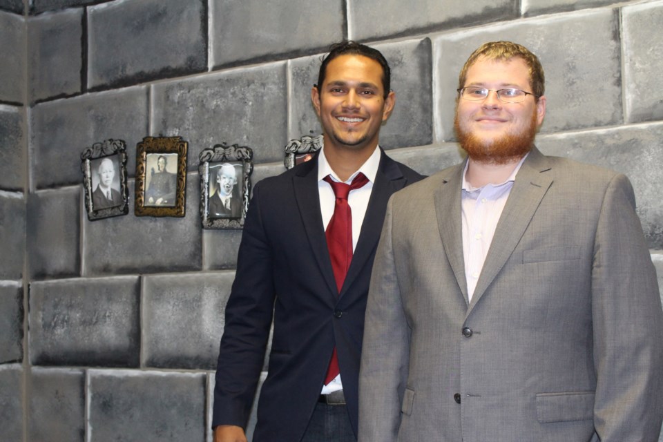 Sudbury Escape Rooms owners Amit Maharajh and Dustin Gennoe stand in their Dracula-themed escape room. Photo by Patrick Demers