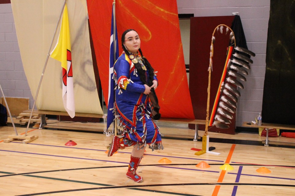 Caydence Webkamigad, a Grade 10 student at St. Charles College, dancing in her traditional jingle dress regalia. (Annie Duncan/Sudbury.com)