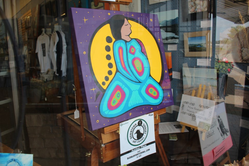 These are just some of the pieces in shop windows along Elgin Street as part of the Downtown Sudbury Art Crawl. (Heidi Ulrichsen/Sudbury.com)