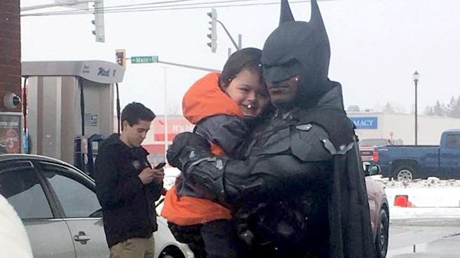 David Knechtel snapped this photo of his nephew, Adam Yasinowski, getting a hug from Batman himself.