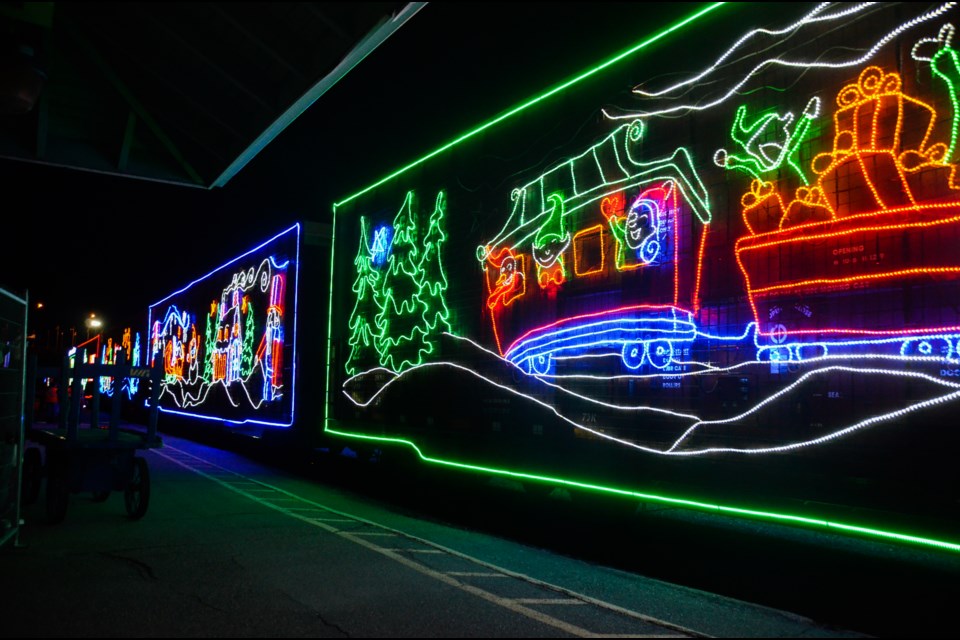 The Holiday Train is about 1,000 feet in length with 14 brightly decorated rail cars. Each car is decorated with hundreds of thousands of technology-leading LED lights and holiday designs. (Marg Seregelyi/MargsPhotography.com)