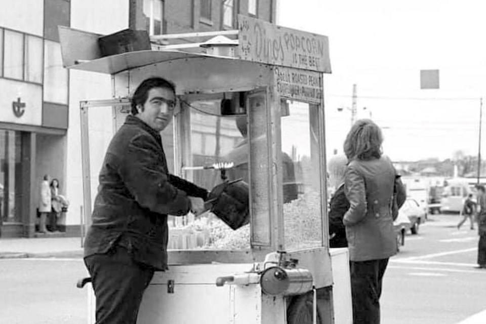 Dino "the Popcorn Man" Theodos with his popcorn stand. Theodos was a legendary figure  in downtown Sudbury for some 25 years.