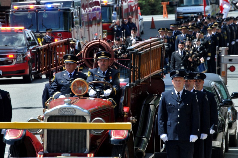 Greater Sudbury emergency services paid tribute to a fallen fighter by parading in full dress from the funeral home to Christ the King Church downtown on June 1, 2022. Greater Sudbury firefighter Mike Frost died at home on May 19.