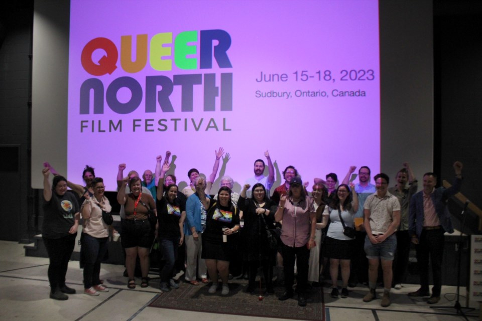Supporters of the Queer North FIlm Festival pose for a group photo at the launch of the festival’s programming June 1.
