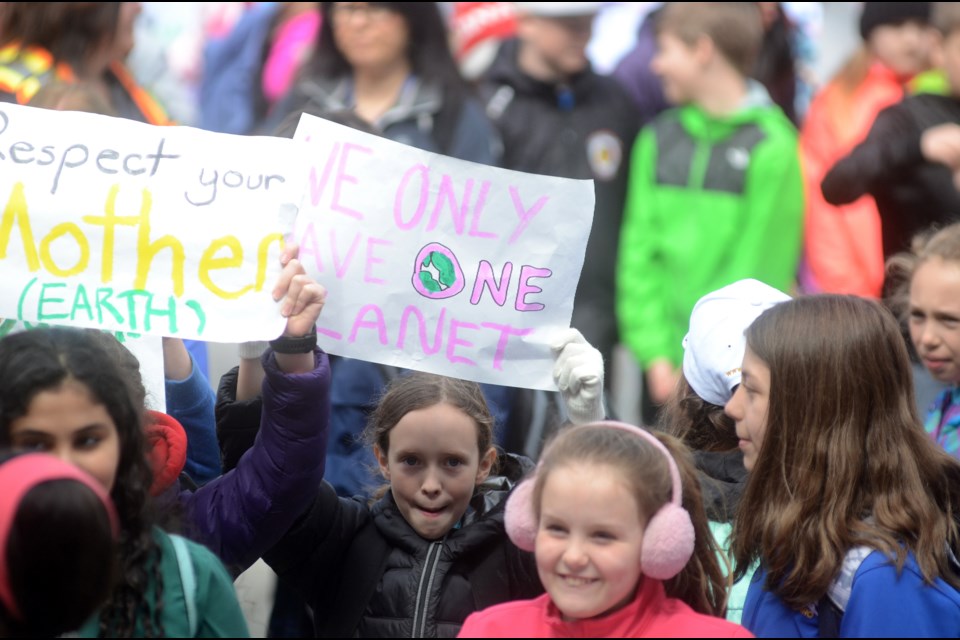 On Friday, hundreds of students from area high schools and elementary schools gathered at the Fraser Auditorium to rally against climate change. (Arron Pickard/Sudbury.com)