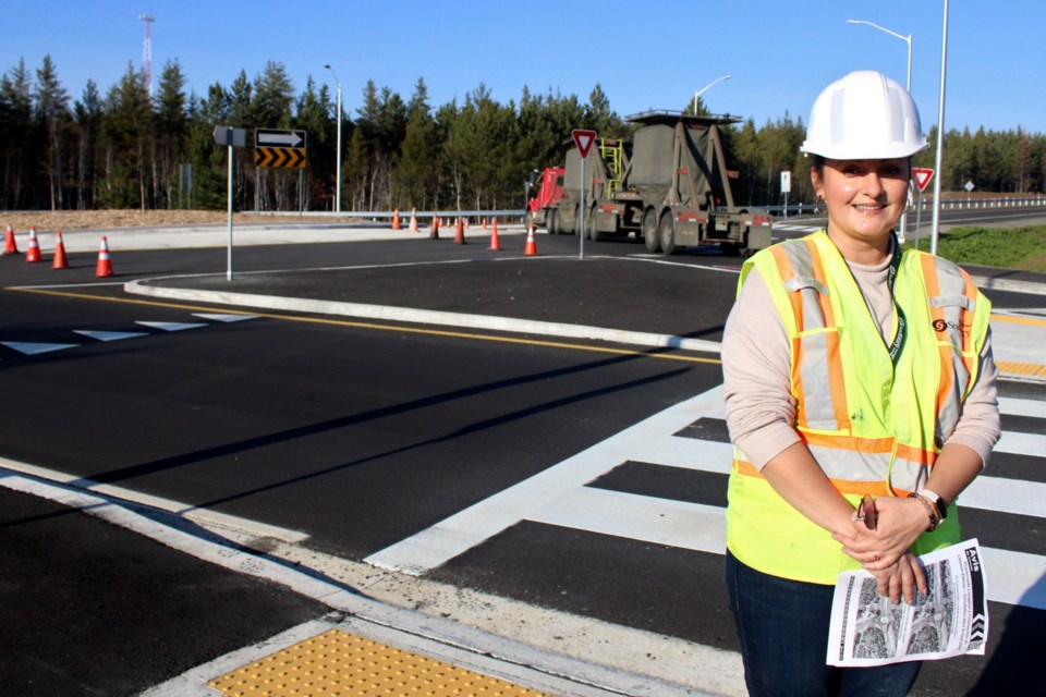 City project manager Miranda Edwards is seen at the new roundabout in Falconbridge, at Longyear Drive and Edison Road.