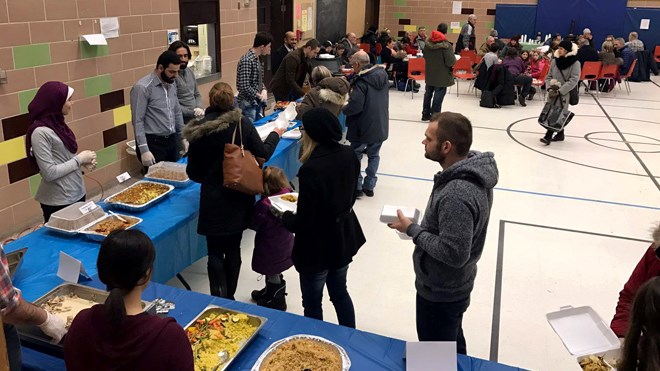 They were lining up outside the door at Lansdowne Public School on Saturday afternoon to get a taste of kibbe and a host of other Middle Eastern food. Photo: Sudbury Muslim Society/Facebook