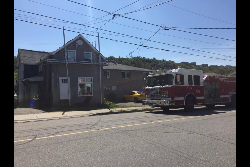 Two homes in the Flour Mill were evacuated for a short time this morning after a gas line was severed. Photo by Patrick Demers