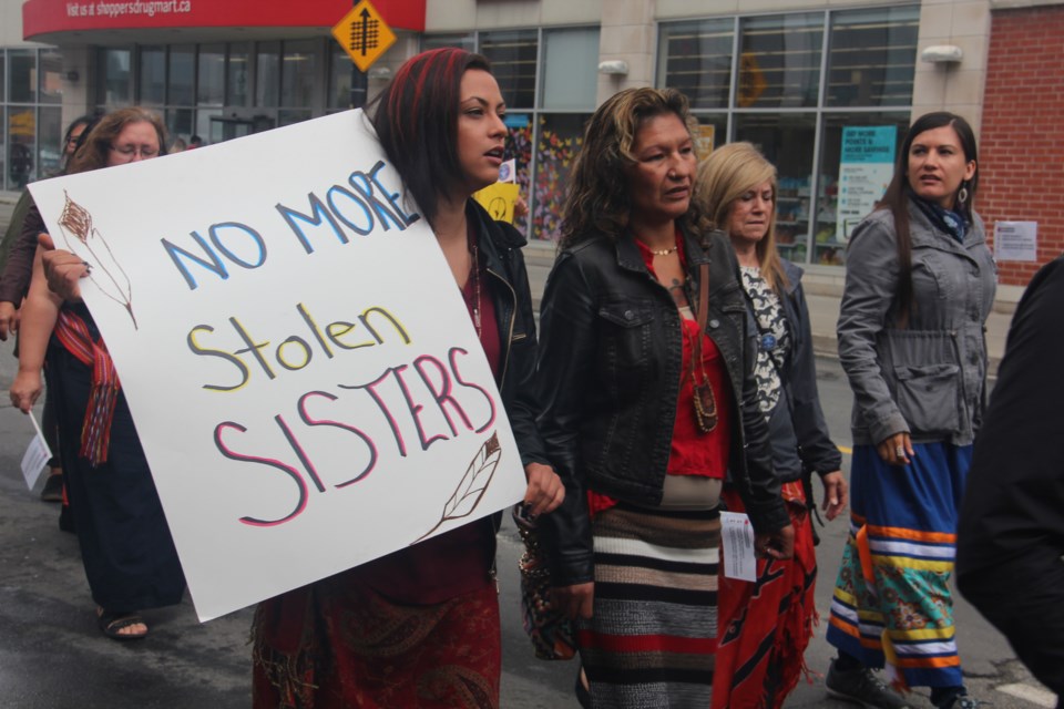 About 60 people took to the streets of downtown Sudbury Oct. 4 for the Sisters in Spirit march. (Heidi Ulrichsen/Sudbury.com)
