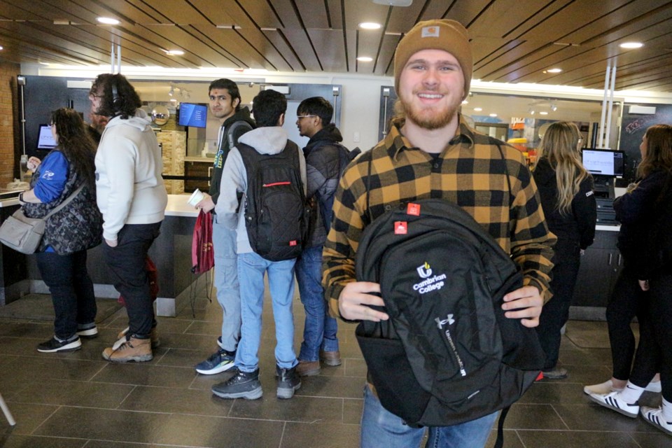 Tye Lamothe, showing off his new backpack, travelled from Carleton Place with his parents to check the school out before starting Cambrian’s Pre-Trades program, which introduces students to the fundamentals of the electrical, mechanical and carpentry trades.