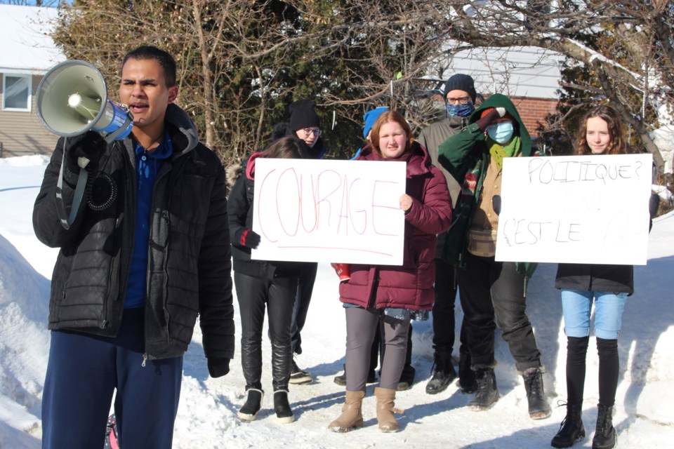 Lo-Ellen Park Secondary School student Ra’Jah Mohamed protests outside of his school Feb. 6 following the Rainbow District School Board’s cancellation of a drag event that was to take place at the school this week.