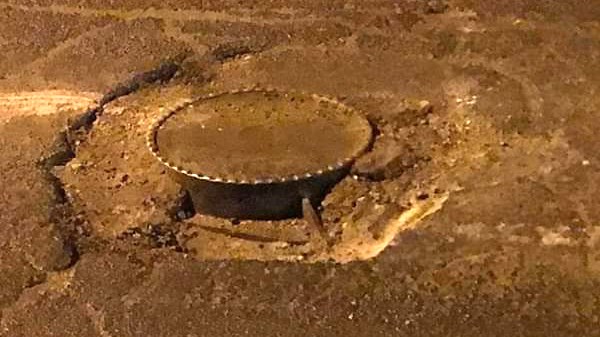 The city filled this huge, deep pothole on Paris Street within hours of being notified about it, but not before it popped the tires on at least three vehicles. (Facebook.com/Teija MacPherson)