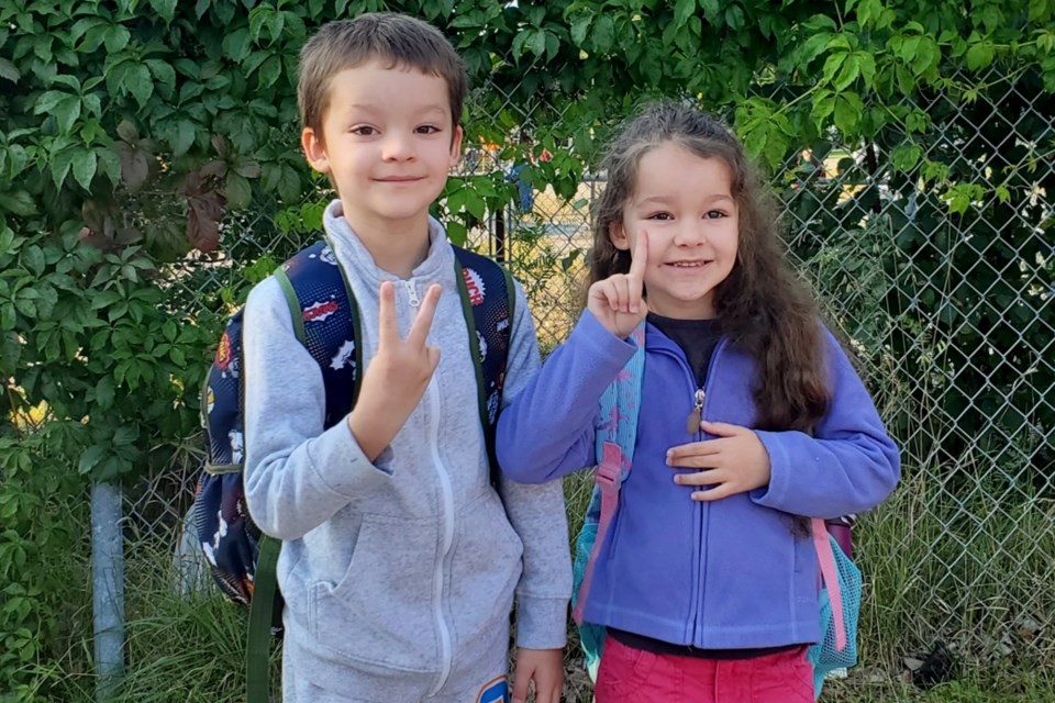 Colton and Bella have big smiles for their first day of school.