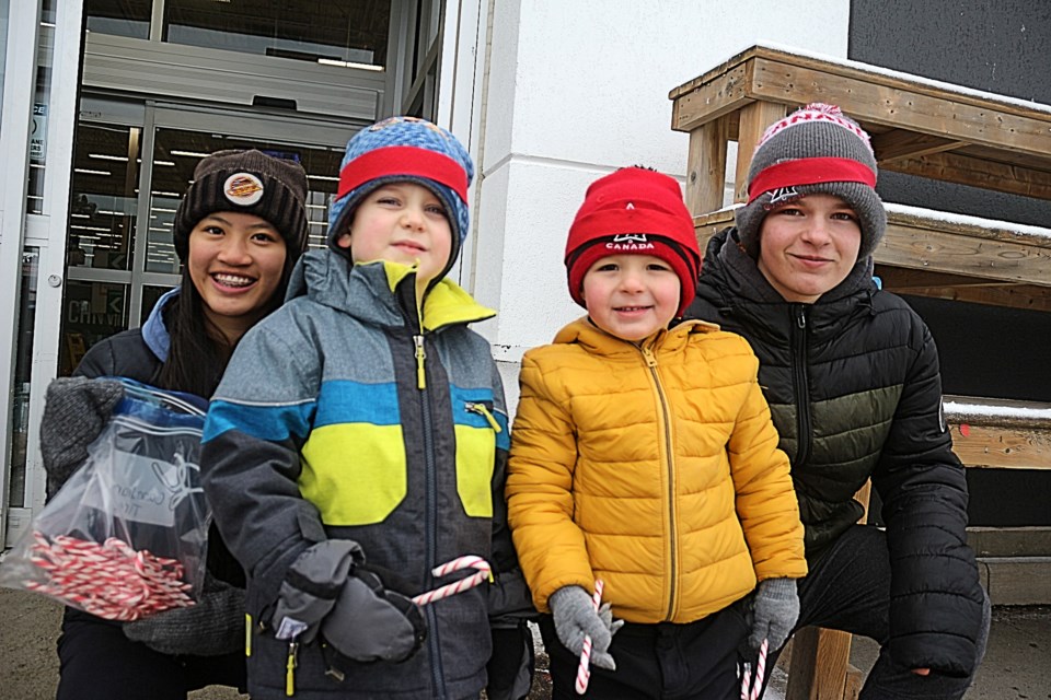 A special collaboration between Grade 9 students at Lo-Ellen Park and junior and senior kindergarteners from R.L. Beattie spreads kindness in the South End on Dec. 6. Pictured is (from left) Tiana Thai, 13, Aiden Aubrey, Jack Cantin and Josiah Rukkila.