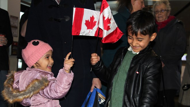 The Alyousef children celebrate their arrival in Canada on Dec. 6, 2016. File photo
